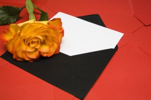 envelope and rose